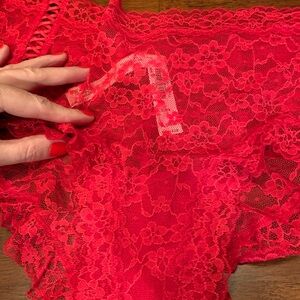 Absolutely stunning red lacy undies size XL, with beautiful  decor on the back
